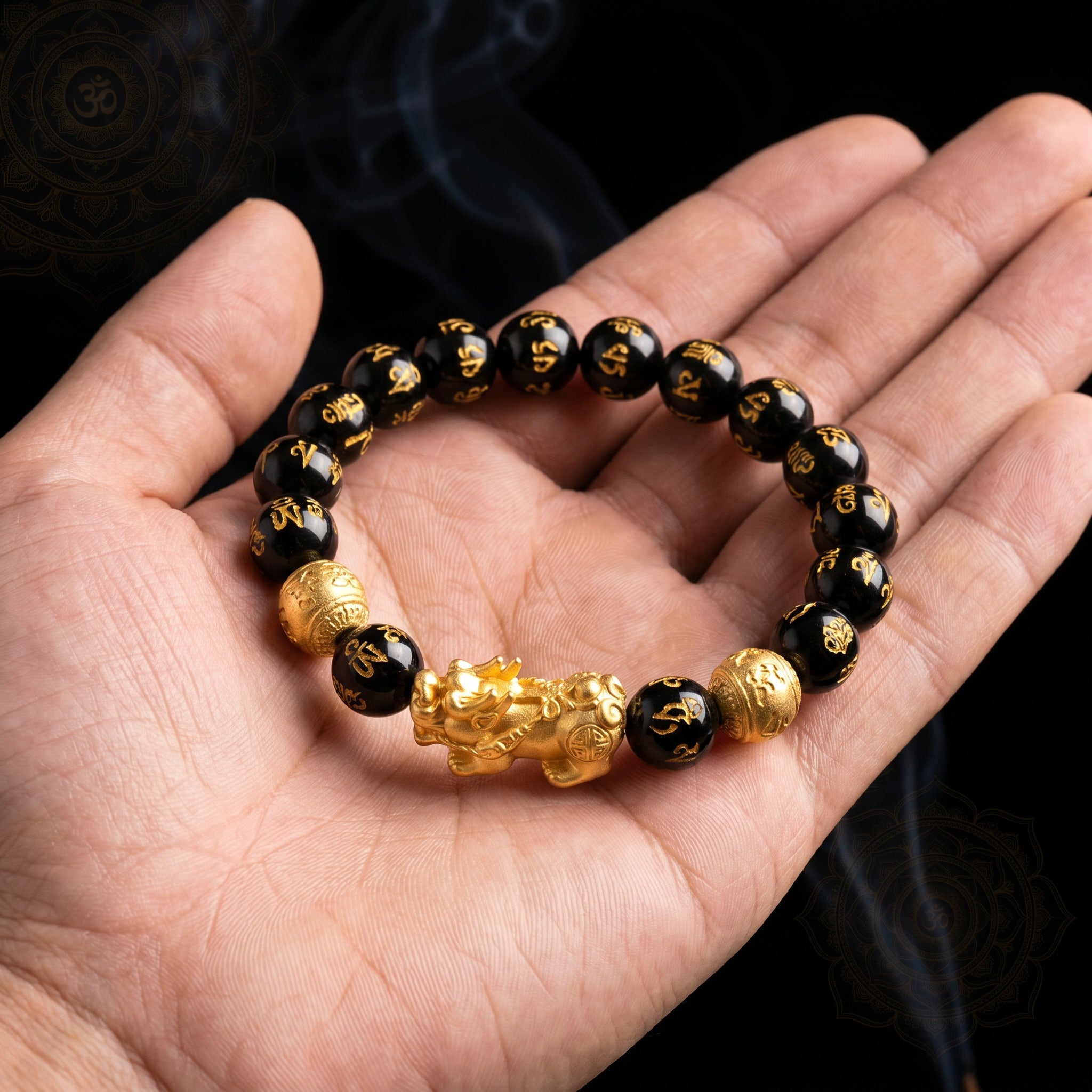 Black obsidian beads and Pixiu symbol detail